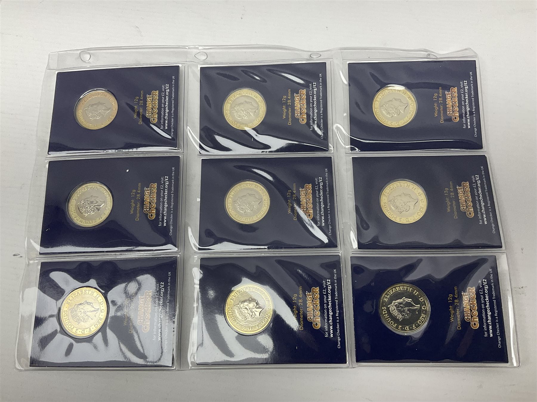 Mostly United Kingdom Queen Elizabeth II commemorative two pound  coins, including 2017 'Jane Austen', 2018 'Sea King', 2018 'Vulcan' etc face value of UK coins approximately 98 GBP