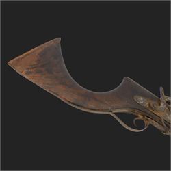 Middle Eastern percussion cap rifle, the 107cm  barrel with four brass bands and ramrod under, overall L143cm, together with another percussion rifle the 106cm barrel a copy of a 17th century Spanish barrel, complete with fake stamp, by vendors repute this rifle was confiscated from tribesmen in Kurdistan by police
Sold as an exempt item under Section 58 (2) of the 1968 Firearms Act, to be held as a curiosity or ornament