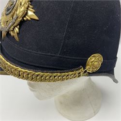 Post-1902 Welsh Regiment Officer's Home Service Blue Cloth Helmet with gilt metal King's crown helmet plate to the front, a removable spike to the top on a shaped cruciform base with rosette fittings, rosette side bosses, brass trim to the front peak, and leather and velvet backed chin scales, with sweat band, the interior with the remains of a makers label at the address 1,3 & 5 Lexington Street, Golden ? London W (presumably Hobson & Sons)
