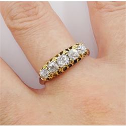 Early 20th century gold graduating five stone old cut diamond ring, total diamond weight approx 1.00 carat 