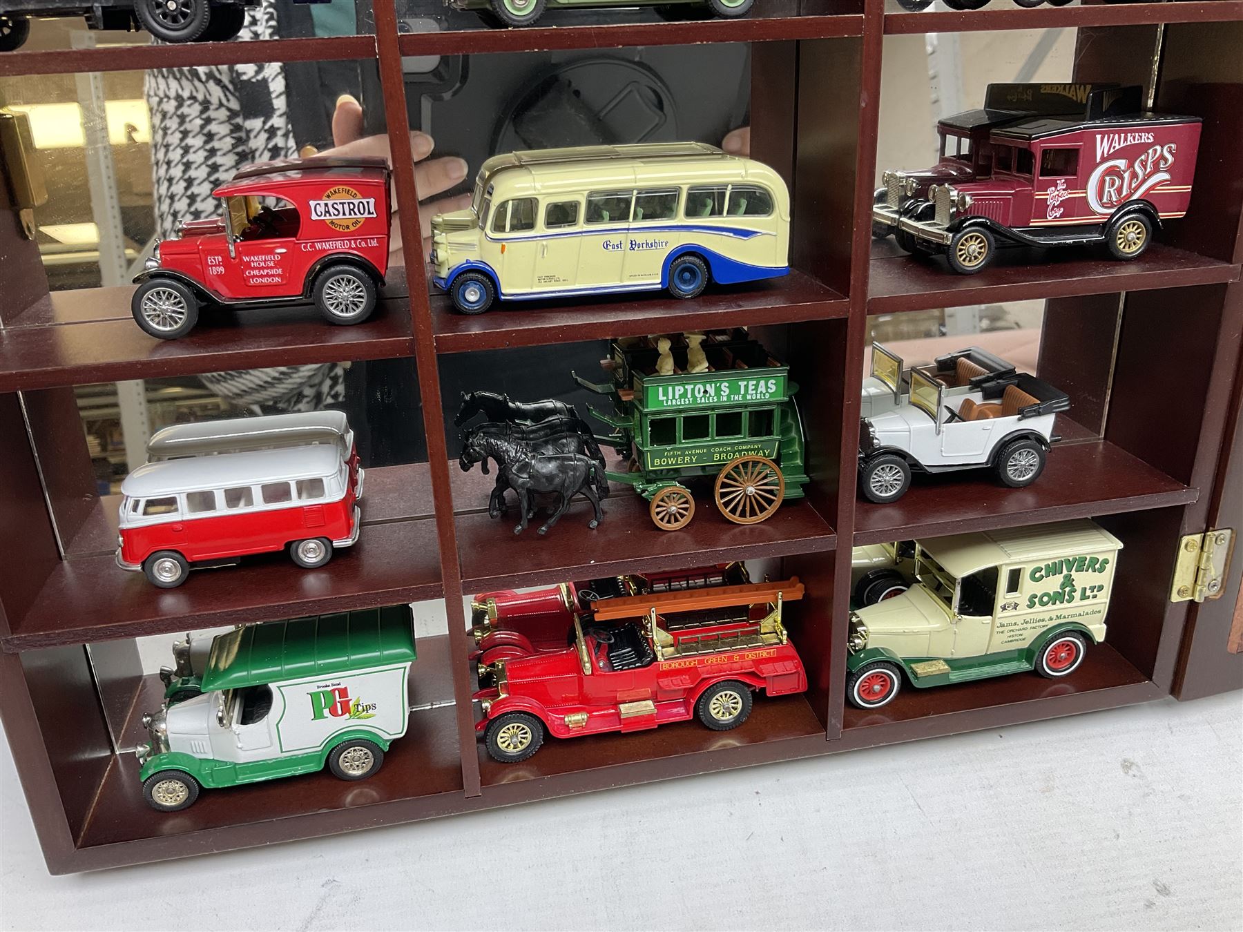 Collection of die-cast vehicles to include Corgi, Dinky, Lledo and Days Gone, housed in six wood display units