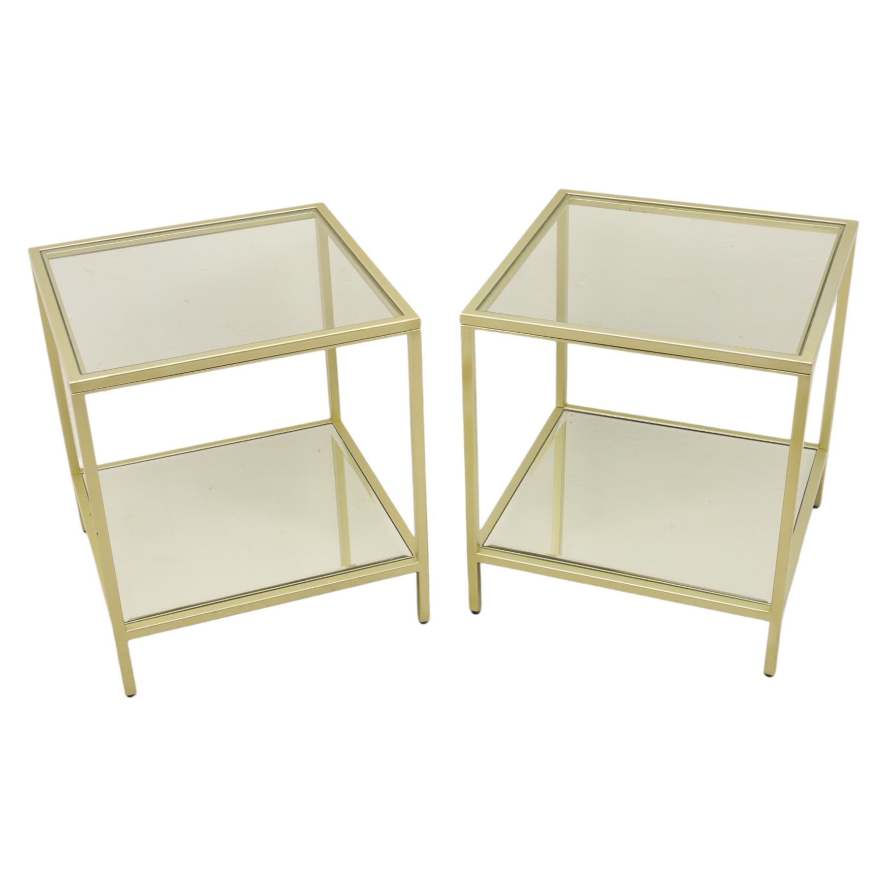 Modern pair of brass finish and glass bedside stands, each of square form with clear glass top, glazed sides and mirrored under tier, enclosed by a square section brass finish metal frame, raised on short square supports