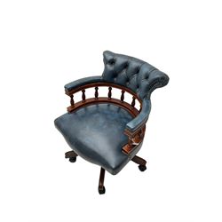 Captains swivel desk chair, upholstered in blue finished buttoned leather