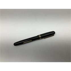 Vintage Swan Mabie Todd lever fill fountain pen in coral red, the nib a/f marked 14K, together with two further vintage Swan Mabie Todd fountain pens, the first example with lever fill, the other leverless, each with black body, one with nib marked 14ct, (3) 