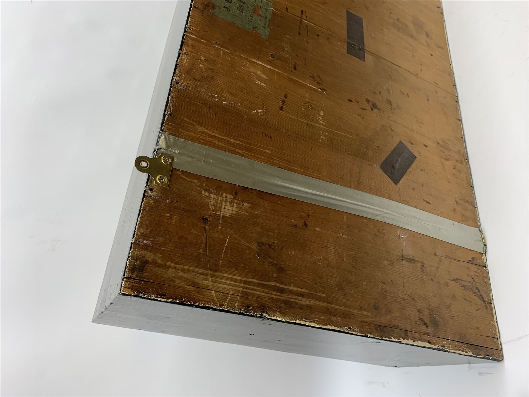 Taxidermy: female Goosander (Mergus Merganser), male Green Wing Teal Duck (Anas Carolinensis), and Little Grebe (Tachybaptus Ruficollis), in naturalistic setting detailed with long grass, set against a painted cream backdrop, encased within an ebonised single pane display case, with taxidermist paper label verso detailed J E Massey, Finkle Street, Malton, H50.5cm W89cm D21cm