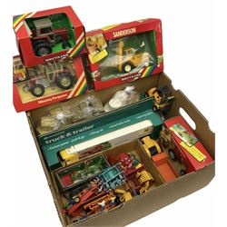 Britains - three Massey Ferguson tractors and Sanderson Rough Terrain Forklift nos.9513, 9514, 9520 & 9529; all boxed; quantity of unboxed accessories and machinery including round baler, hay baler, conveyor, snow plough, post hole auger, Kidd roller, hay bales, milk churns, sacks etc; together with two boxed Morrison delivery trucks etc