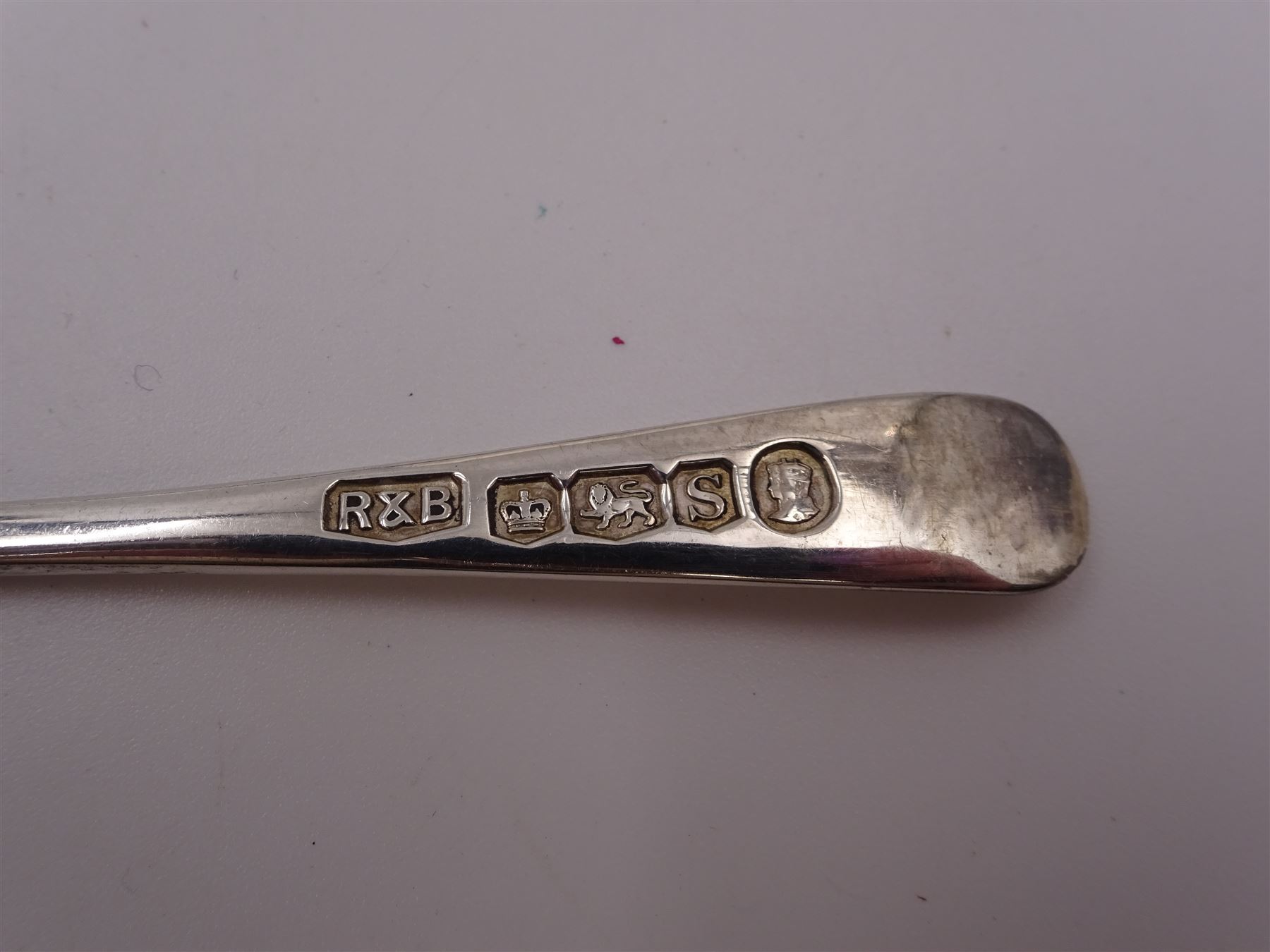 Set of six 1930s silver 'British Hallmarks' spoons by Roberts & Belk Ltd, each depicting a different British hallmark, dated 1935, in fitted case
