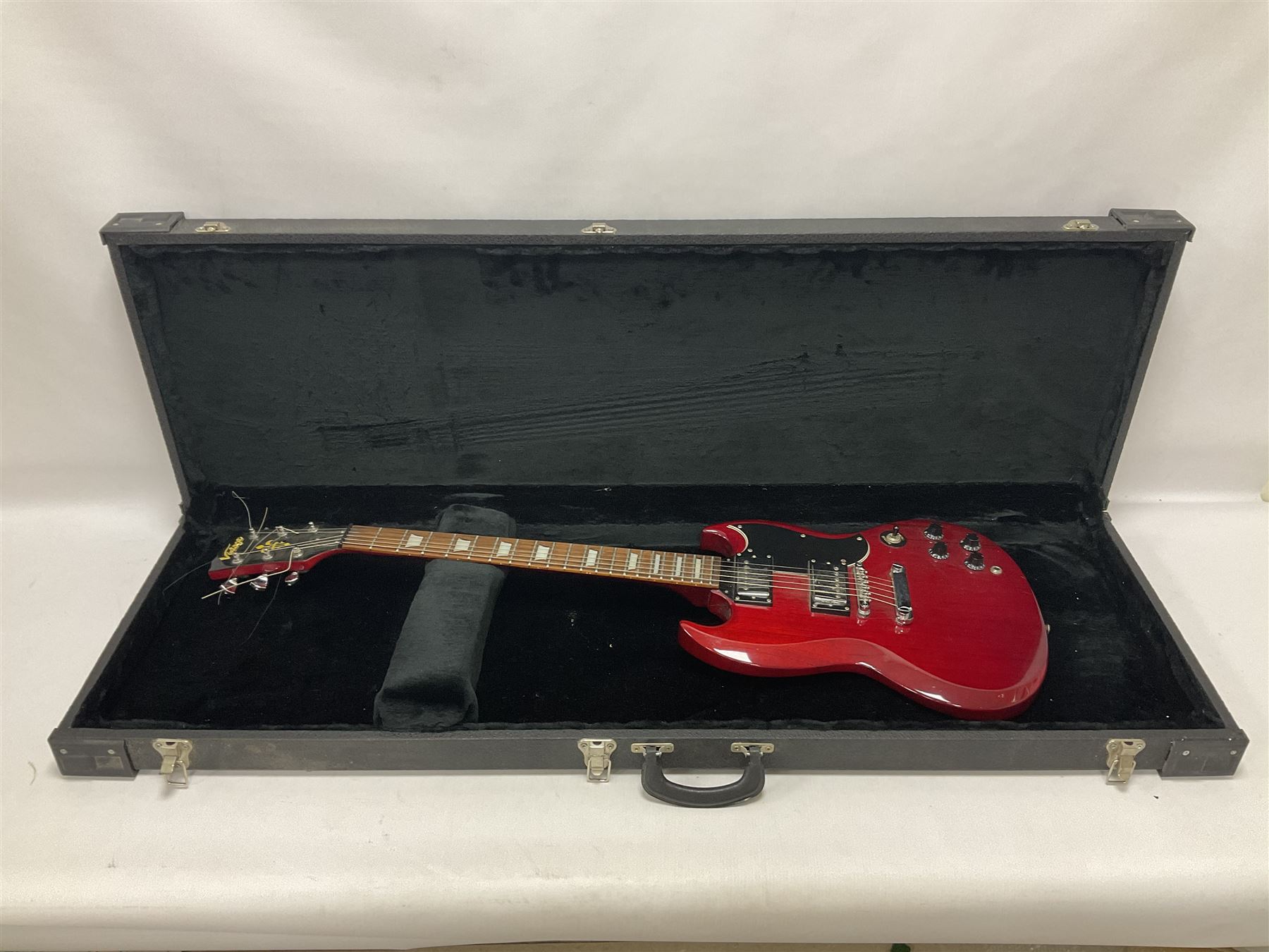 Vintage VS6M Reissued Series six string electric guitar, with solid body in cherry red finish, in carrying case, guitar L103cm