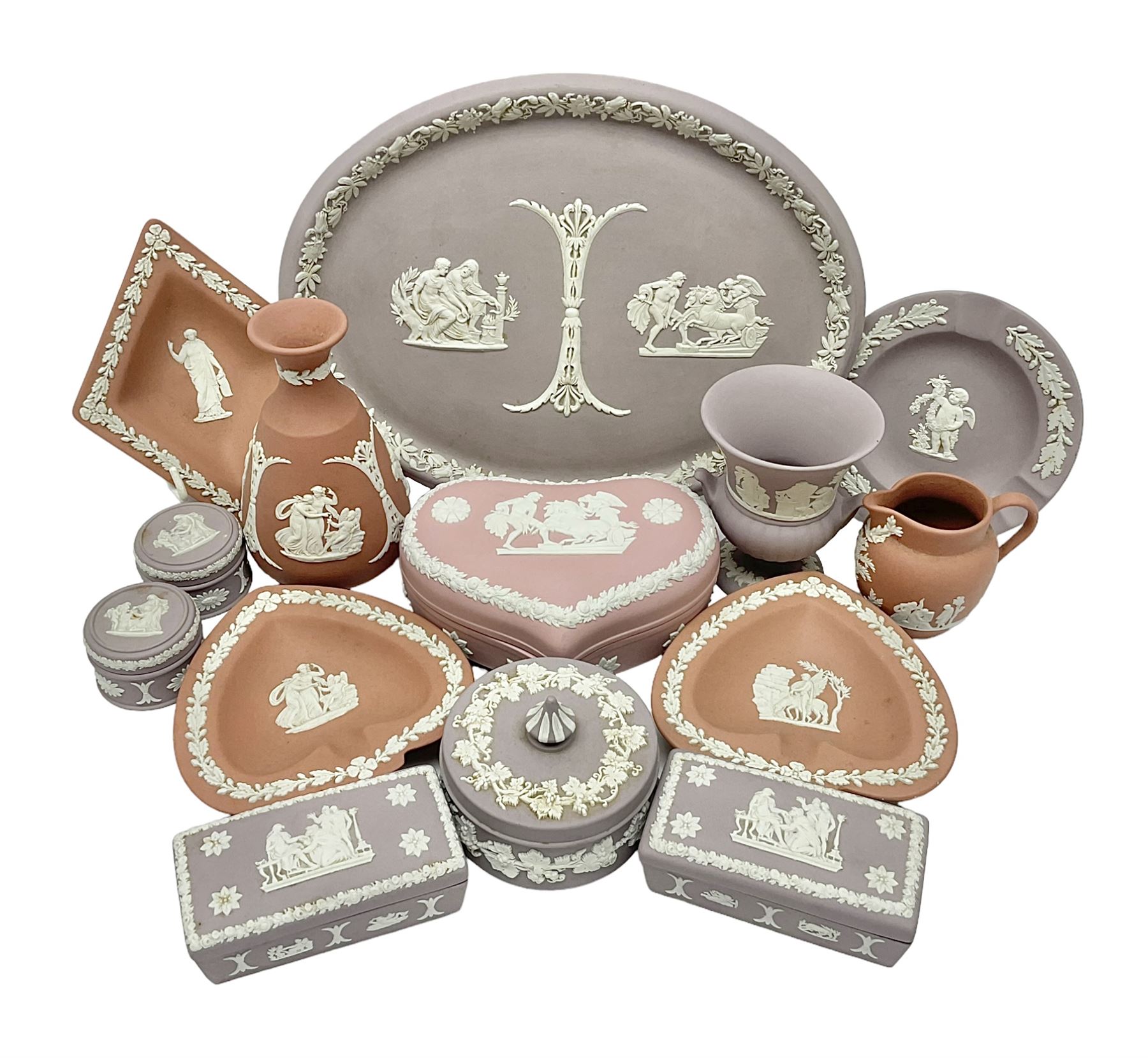 Collection of Wedgwood Jasperware, in orange, lilac and pink colourways, including oval tray, small jug, trinket boxes, trinket dishes, etc , all with impressed mark beneath