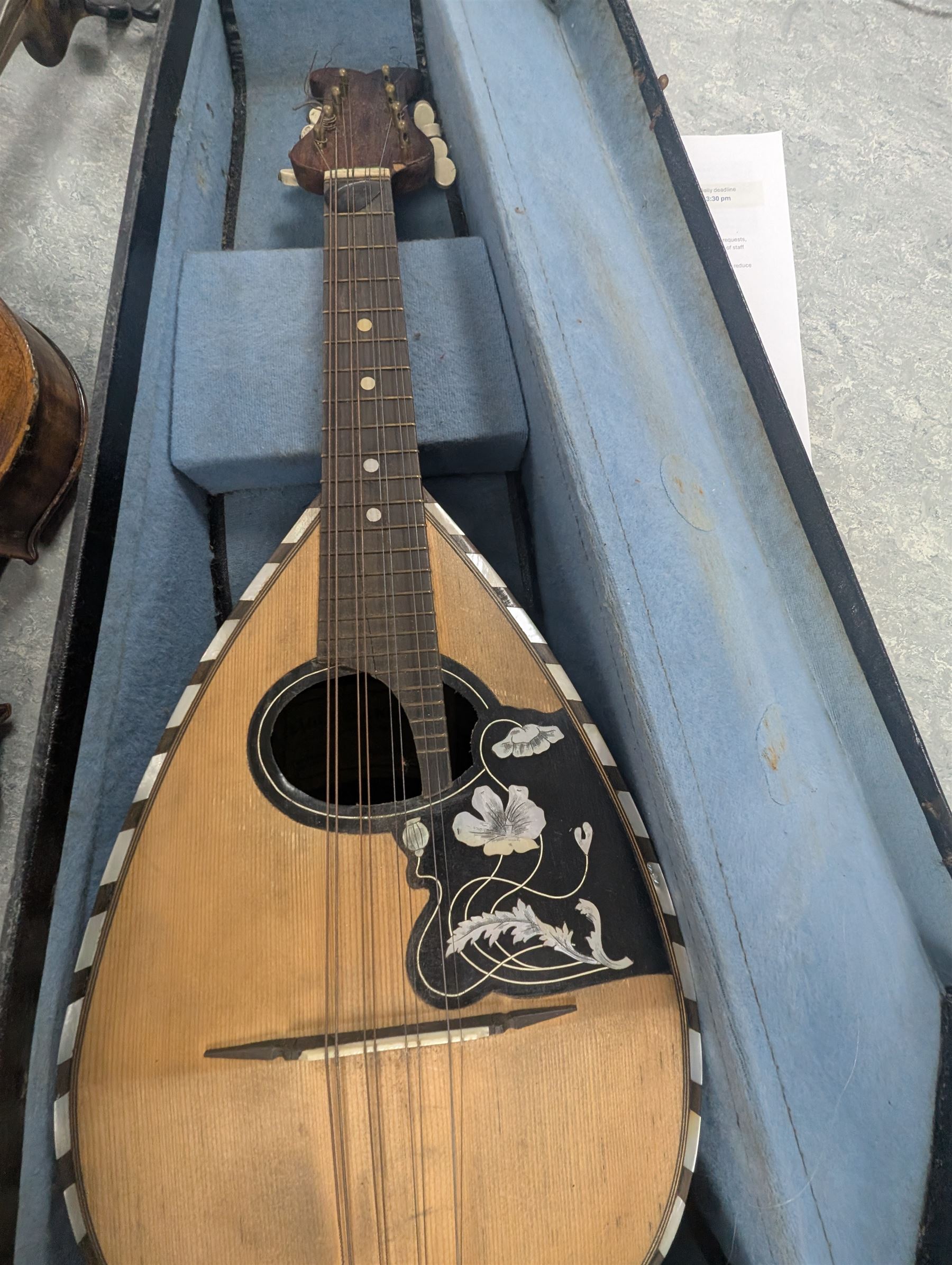 Two violins, including Excelsior example in coffin case and one with spurious William Duke label, and a Luigi D'Ancora mandolin