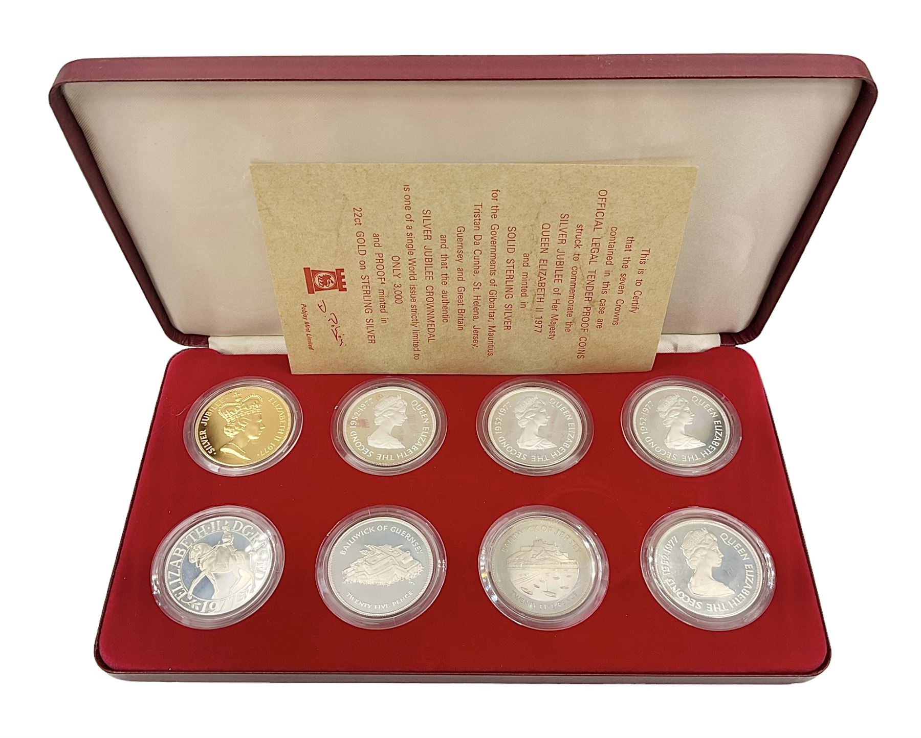 Pobjoy Mint sterling silver proof seven crown coin and gold plated sterling silver proof 'Silver Jubilee Crownmedal' set, commemorating the 'Silver Jubilee of Her Majesty Queen Elizabeth II 1977', cased with certificate