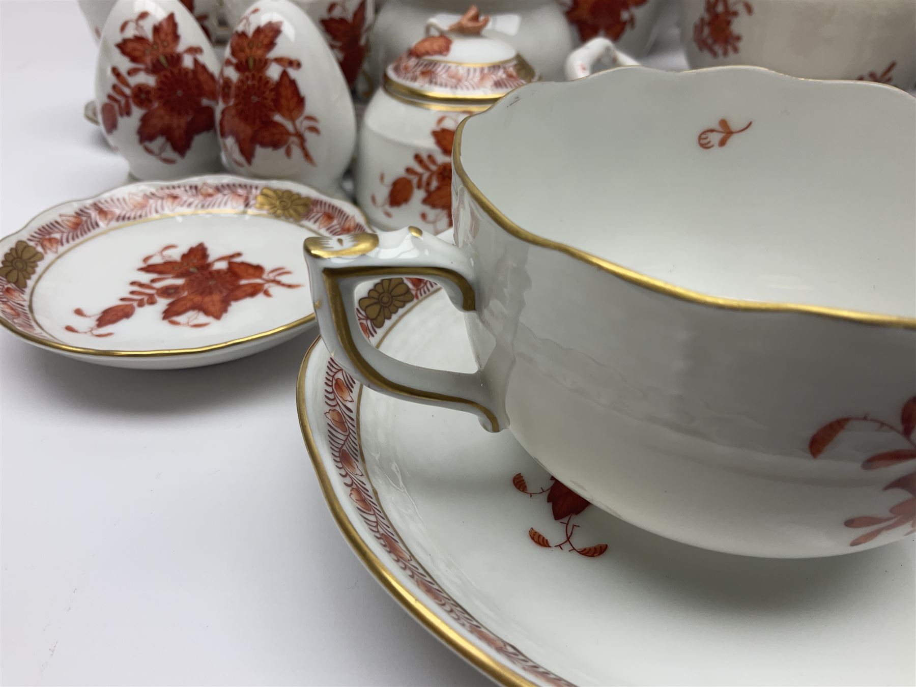 Herend Chinese Bouquet Rose pattern tea service comprising teapot, coffee pot, open sucrier, six cups and saucers, six tea plates, cream jug and stand, milk jug, two teabag holders, preserve pot, two leaf shaped dishes, four egg cups, salt & pepper pots, pair side plates and another plate