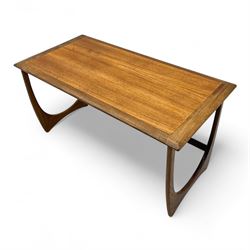 G-Plan - 'Astro' mid mid-century long teak coffee table with two nesting tables, rectangular top with outer banding, above two square top occasional tables on U-shaped end supports united by a stretcher