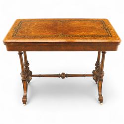 Victorian walnut and inlaid games table, rectangular fold-over top with figured walnut ven...