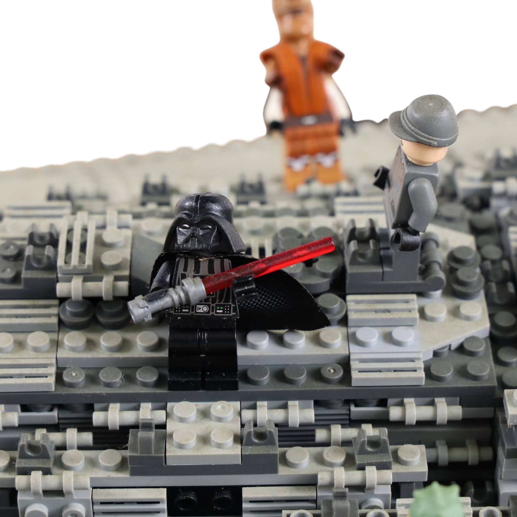 Three Lepin Star Wnrs built models, comprising Red Five X-Wing Starfighter no. 05039, Millennium Falcon no. 05132 and Super Star Destroyer no. 05028