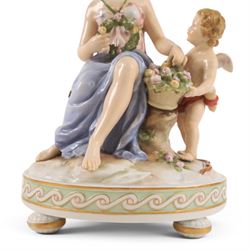 Karl Ens of Volkstedt figure group, modelled as a woman and cherub in a garden, with printed mark beneath, together with another figure modelled as a muse 