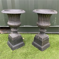 Pair of medium cast iron bronze finish garden urns, egg and dart rim, pedestal base
 - THIS LOT IS TO BE COLLECTED BY APPOINTMENT FROM DUGGLEBY STORAGE, GREAT HILL, EASTFIELD, SCARBOROUGH, YO11 3TX