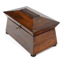 Victorian rosewood tea caddy, of sarcophagus form with mother of pearl escutcheon, upon four squat bun feet, H19cm