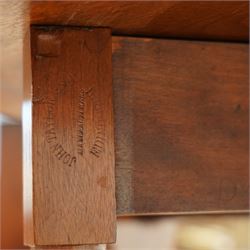 John Taylor & Son, Edinburgh - Late Victorian Aesthetic style walnut Sutherland table, with a hinged oval top on fret carved support, stamped John Taylor & Son Edinburgh, supported by scrolled feet on ceramic castor (Extended 105cm)