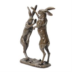 Bronze figure group, modelled as two male hares boxing, upon a naturalistic base, with foundry mark, H27cm