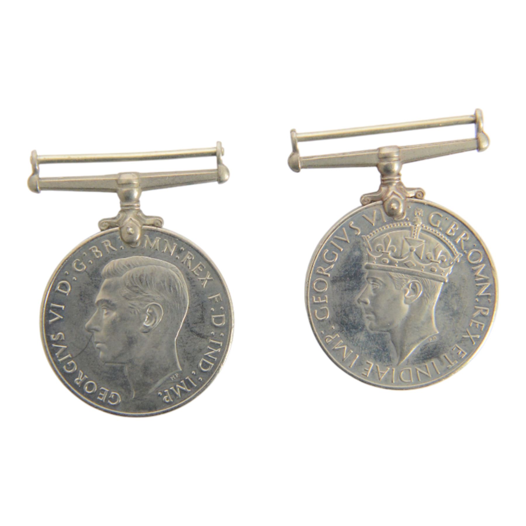 WWII trio, War medal, 1939-45 star and Atlantic star, awarded to Albert Harris R.N, together with WWII trio, War medal, 1939-45 star and The African Star, awarded to Pilot Officer P Eastman and another war and defence medal     