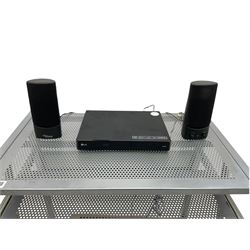 LG BP250 Blu-ray player, Sony floppy disk drive, pair Fujitsu speakers and various cables on computer stand