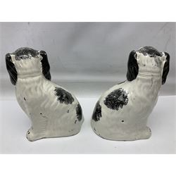 Pair of Staffordshire style dogs, together with a three composite cat figures and one other 