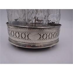 Late 18th century silver cruet stand, of oval form, with pierced sides upon four bun feet, hallmarked to handle Hester Bateman, all other hallmarks indistinct, together with five matched silver mounted cut glass cruet bottles, including some later Victorian examples, hallmarks predominantly indistinct, stand H20cm