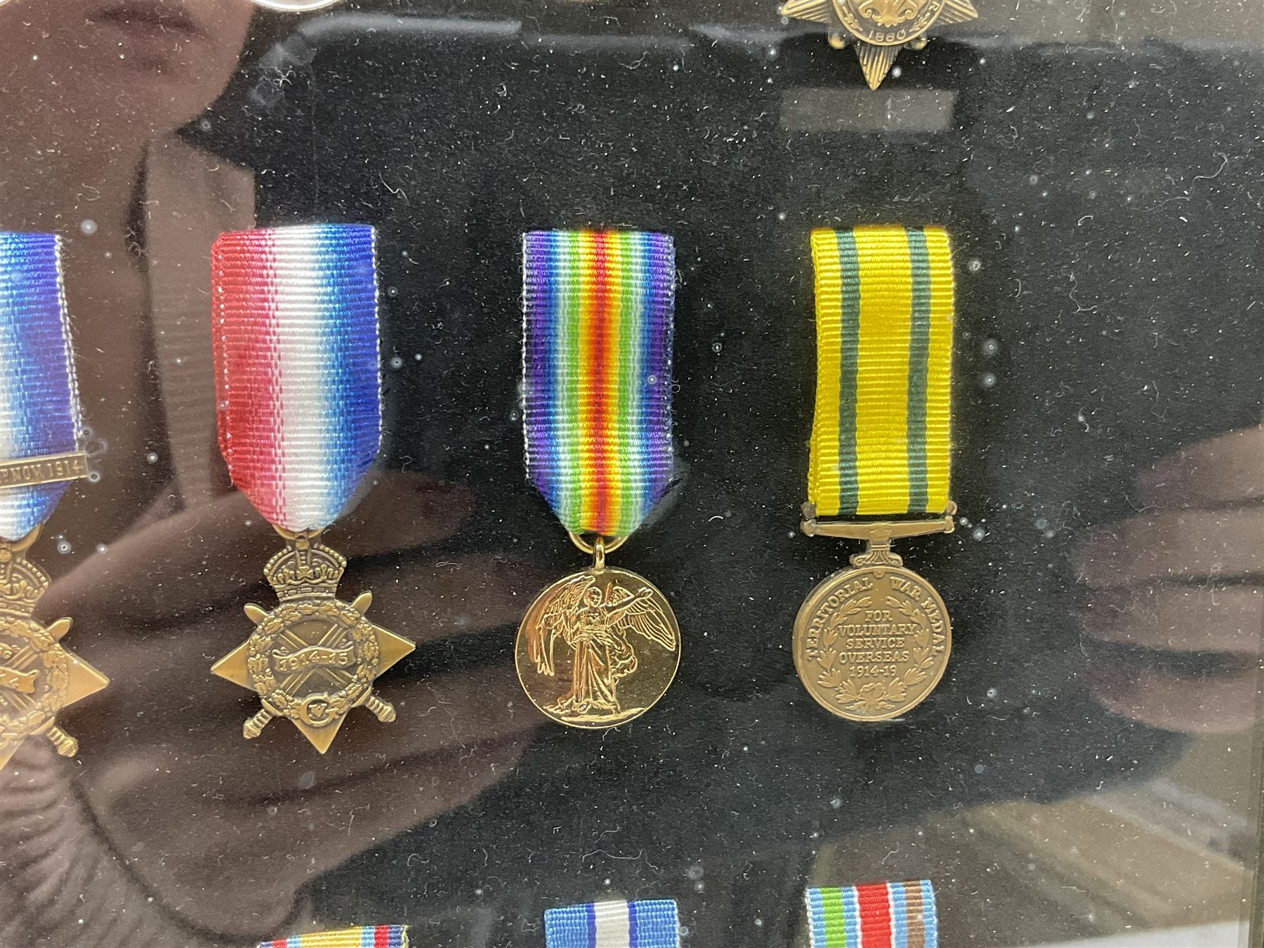 Limited edition large framed display board with sixty half-size copies of British Gallantry and Campaign Medals produced by Danbury Mint; all with ribbons and associated booklet