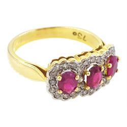 18ct gold three stone oval cut ruby and diamond cluster ring, stamped 750