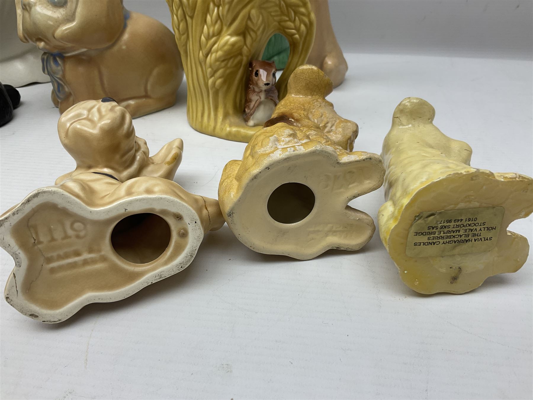 Collection of Sylvac and similar animal figures, including rabbits, hares and dogs, together with Falcon budgie vase, etc 
