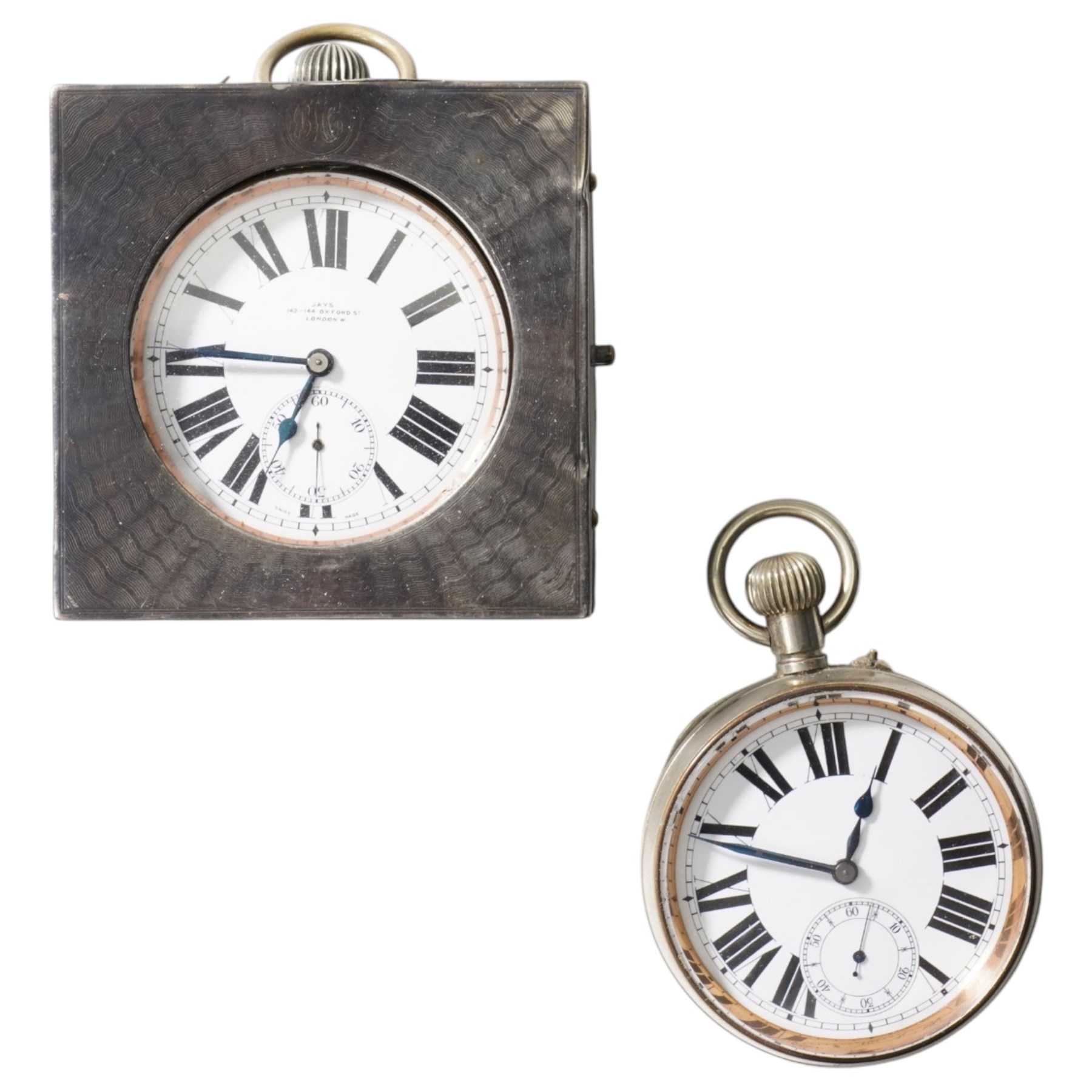 Early 20th century nickle cased goliath pocket watch by Jays, London, in silver engine turned travelling case London 1913 and one other nickle cased goliath pocket watch