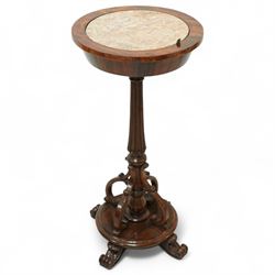 An early Victorian rosewood plant stand with removable marble top, with metal interior liner, circular top above fluted column with arched scroll supports on turned base with scroll feet 