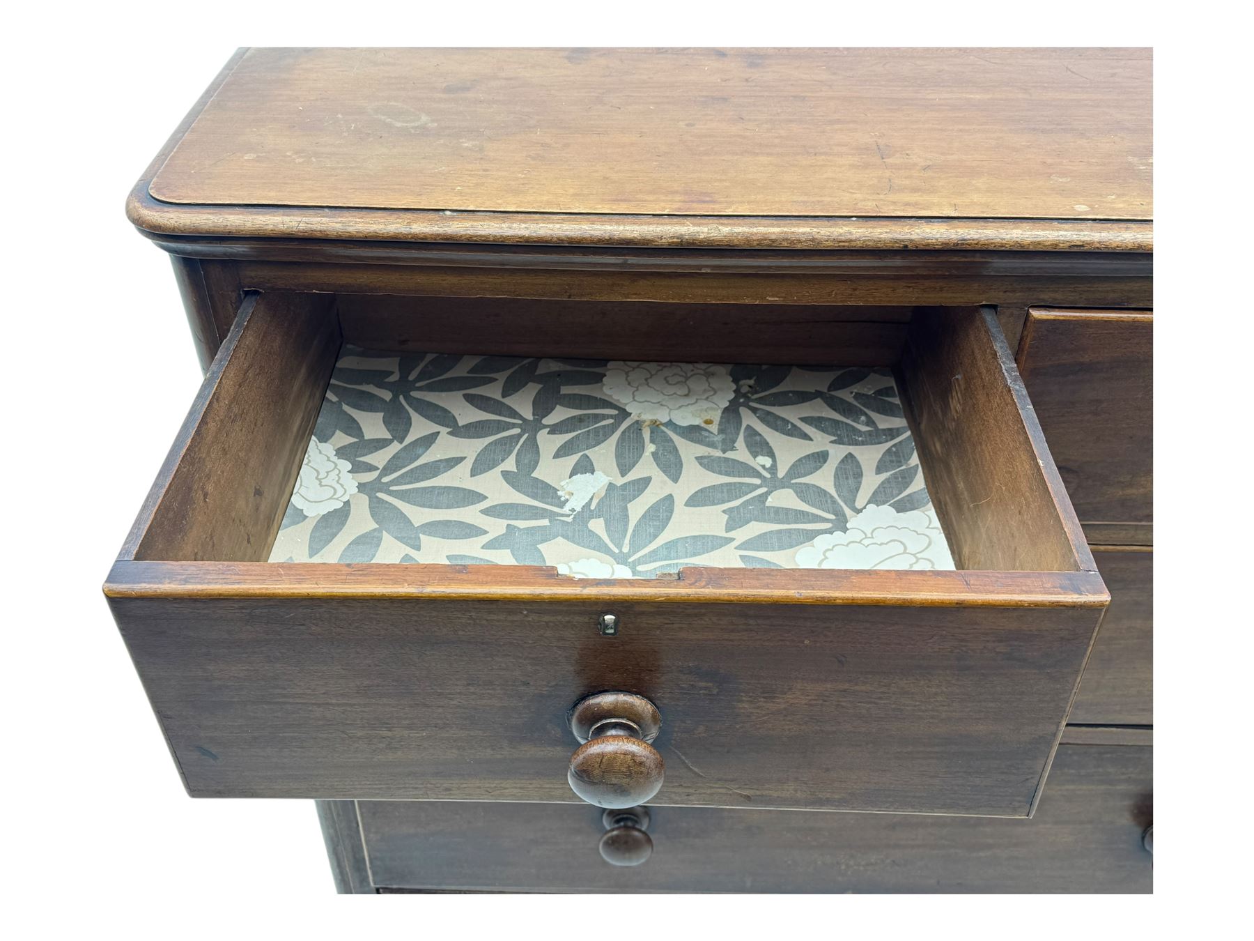 19th century mahogany chest of drawers, rectangular top over two short and three long graduated cockbeaded drawers, raised on compressed bun feet