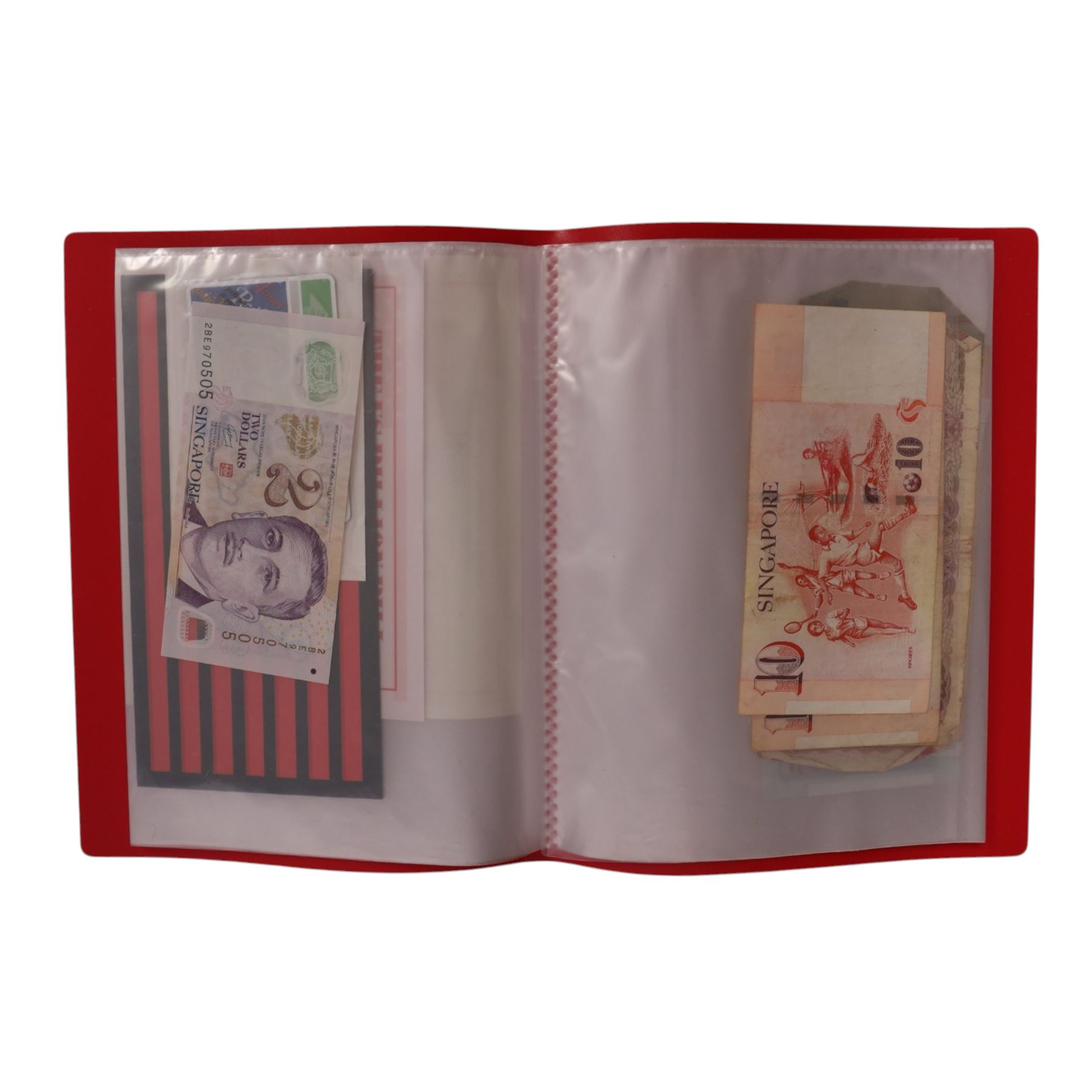 Great British and World banknotes, including many uncirculated examples, housed in ten folders