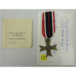  WWll German Merit Cross without Swords with an embossed card and printed card form the offices of the Fuhrer (2)  