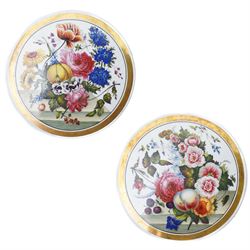 Pair of 19th century French porcelain circular plaques, each painted with fruit and flower...