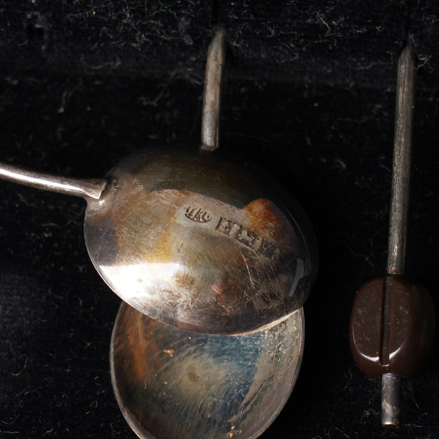 Set of six silver seal top coffee spoons and tongs Sheffield 1924 Maker Cooper Bros & Sons Ltd, cased and a set of six silver bead knop coffee spoons, cased
