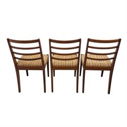 Mid-20th century teak oval extending dining table with set of six teak ladder back chairs with upholstered seats, table W150xD91xH74cm, 199cm extended, chairs W41xD43xH94cm