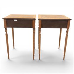 Traditional design pair of walnut lamp tables, figured top with crossbanded edge, above a single frieze drawer with brass oval handles, raised on turned supports