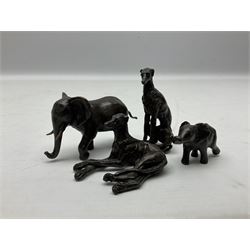 Collection of four bronze animal miniature figures, comprising two greyhounds modelled in recumbent position and sitting, and two elephants modelled in striding pose, tallest H7cm