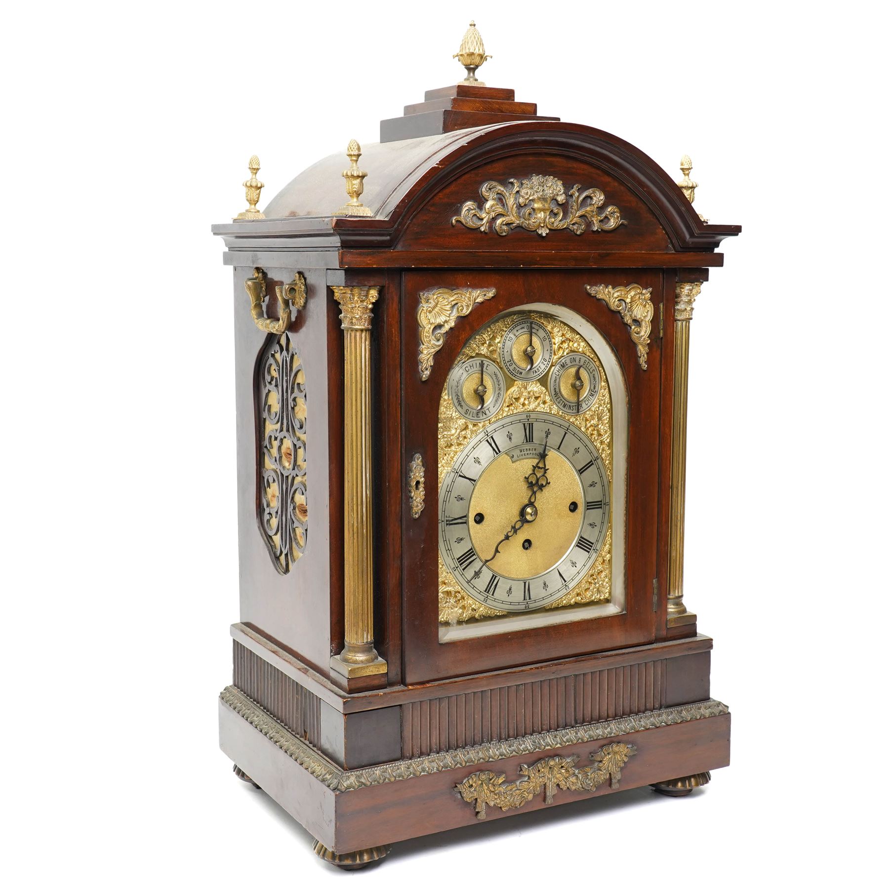 Late 19th century bracket clock with three train movement, Westminster Chimes on eight bells and gong strike, the brass dial inscribed 'Webber Liverpool' with gilt brass mounts in mahogany dome top case with pineapple finial, brass handles and classical columns on compressed circular feet H76cm