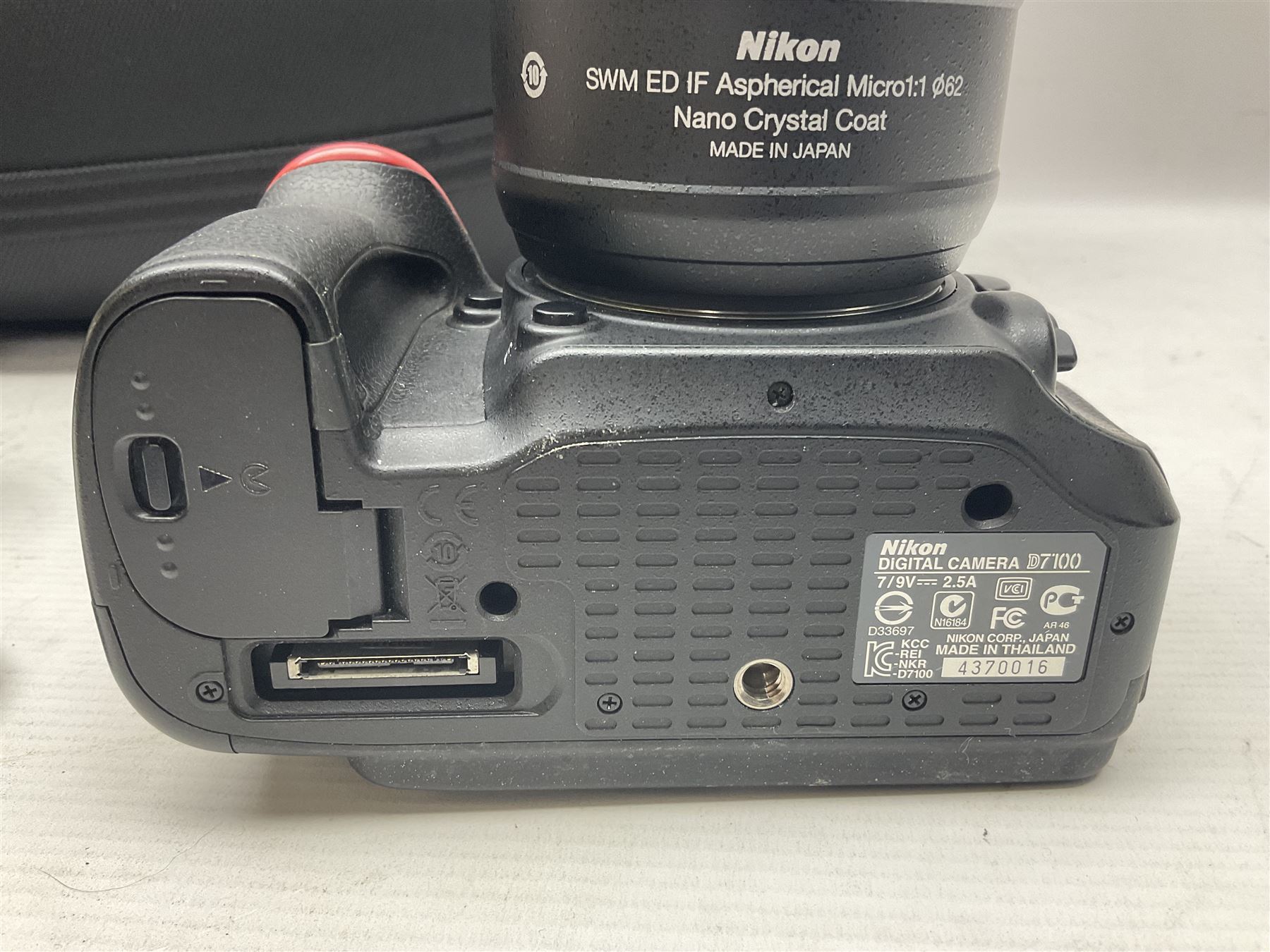 Nikon D7100 camera body, serial no 4370016, with Nikon 'AF-S Micro Nikkor 60mm 1:2.8G ED' lens serial no 234883 and battery Grip HN-D7100, with Lowepro camera bag  
