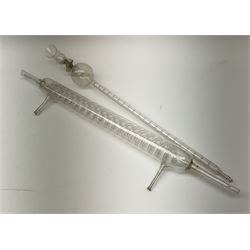 Collection of 19th century and later pharmaceutical laboratory glass, to include, large filter funnel, graham condenser, conical flask, bell jar and another with graduated tube, Provenance: discovered in the storeroom of a long established Hull pharmacist and opticians