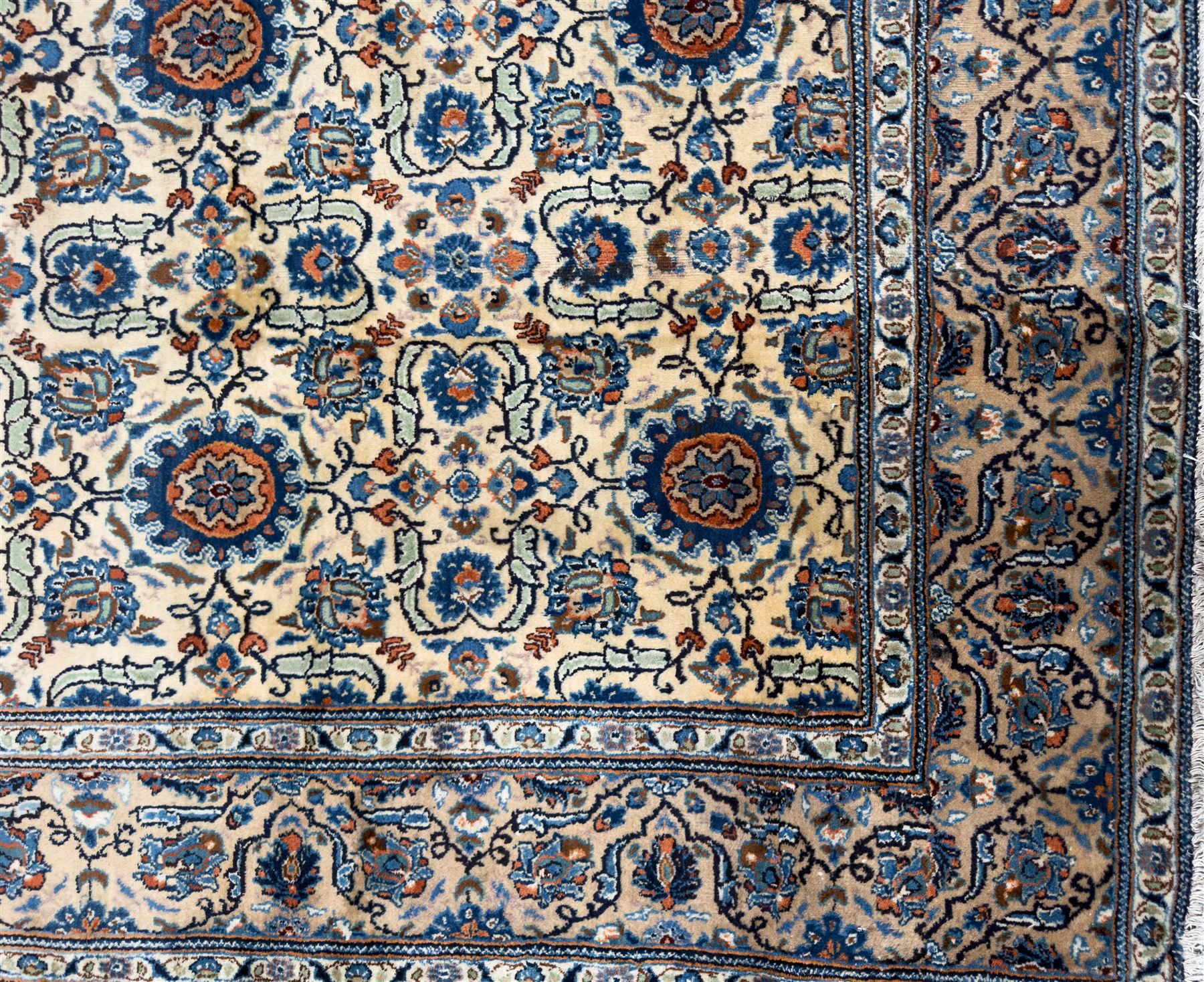Northwestern Persian Tabriz hand-knotted carpet, the ivory ground with an all-over repeating Herati pattern of stylised palmettes, rosettes and serrated leaves in shades of indigo, terracotta and sky blue, framed by a dark blue border of arabesque vines and scrolling foliage between floral guard stripes, from the region of Tabriz