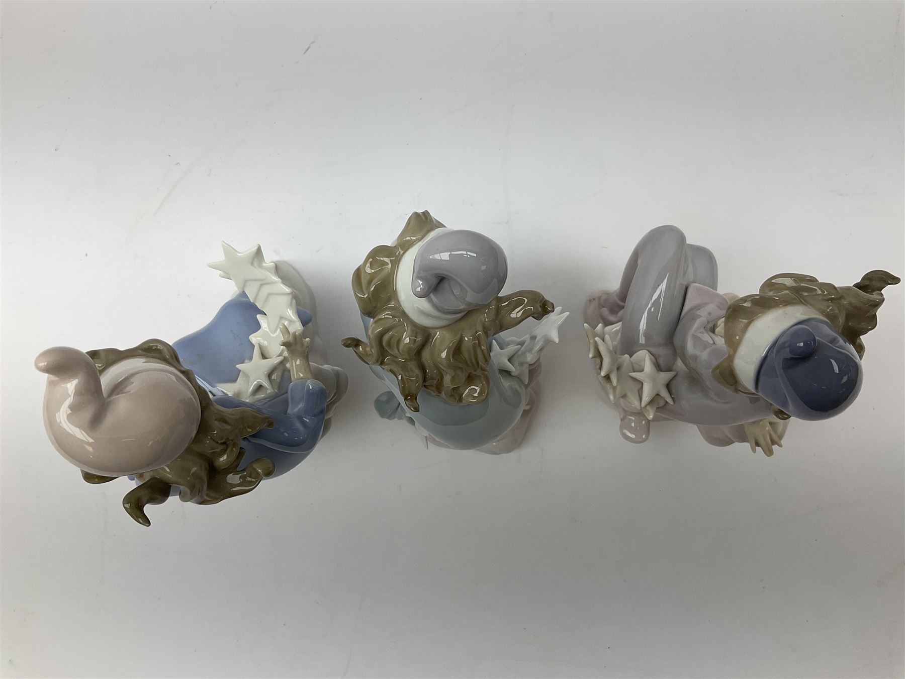 Lladro Star Bright Girl set, comprising Wishing on a Star no 1475, Starlight Starbright no 1476 and Stargazing  no 1477, all in original boxes, largest example H19cm