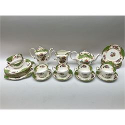 Paragon Rockingham pattern tea set, comprising teapot, coffee pot, four teacups and four saucers, six side plates, six dessert plates, cake plate, two open sucriers, and jug. 