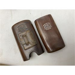 Victorian leather cigar protector with metal match striking plate on the end and internal spring to hold the cigars in place; expands for differing lengths of cigar, minimum L12.5cm; another similar leather cigar case marked Middlemore's Patent with attached vesta case and striker; three Bryant & Mays tin-late matchbox holders including 1935 Jubilee; and small box of matches (6)