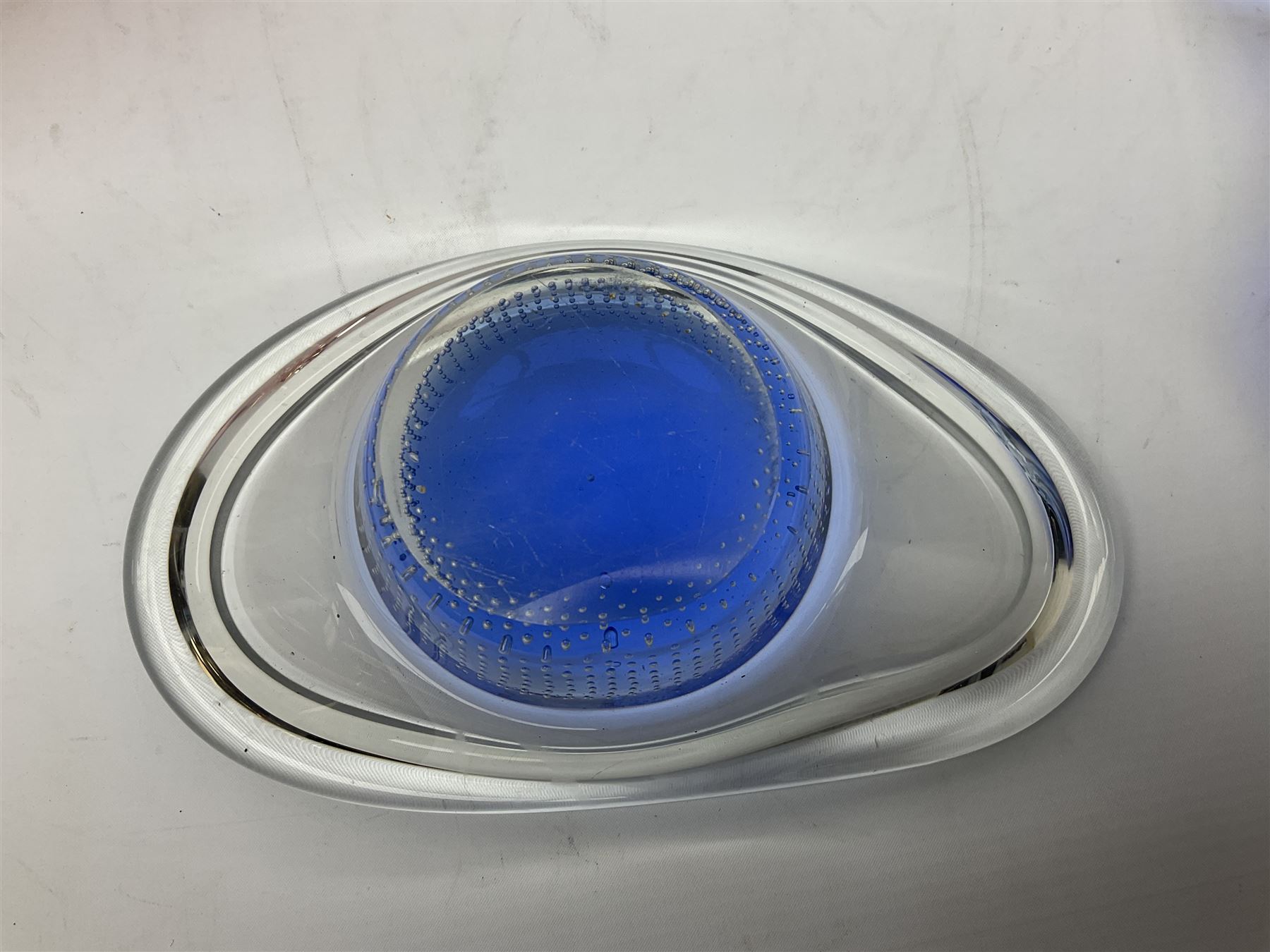 Two Whitefriars glass jugs, together with a Swedish Pukeberg art glass vase and three art glass bowls, including large pink example, some signed to base, tallest H30.5cm