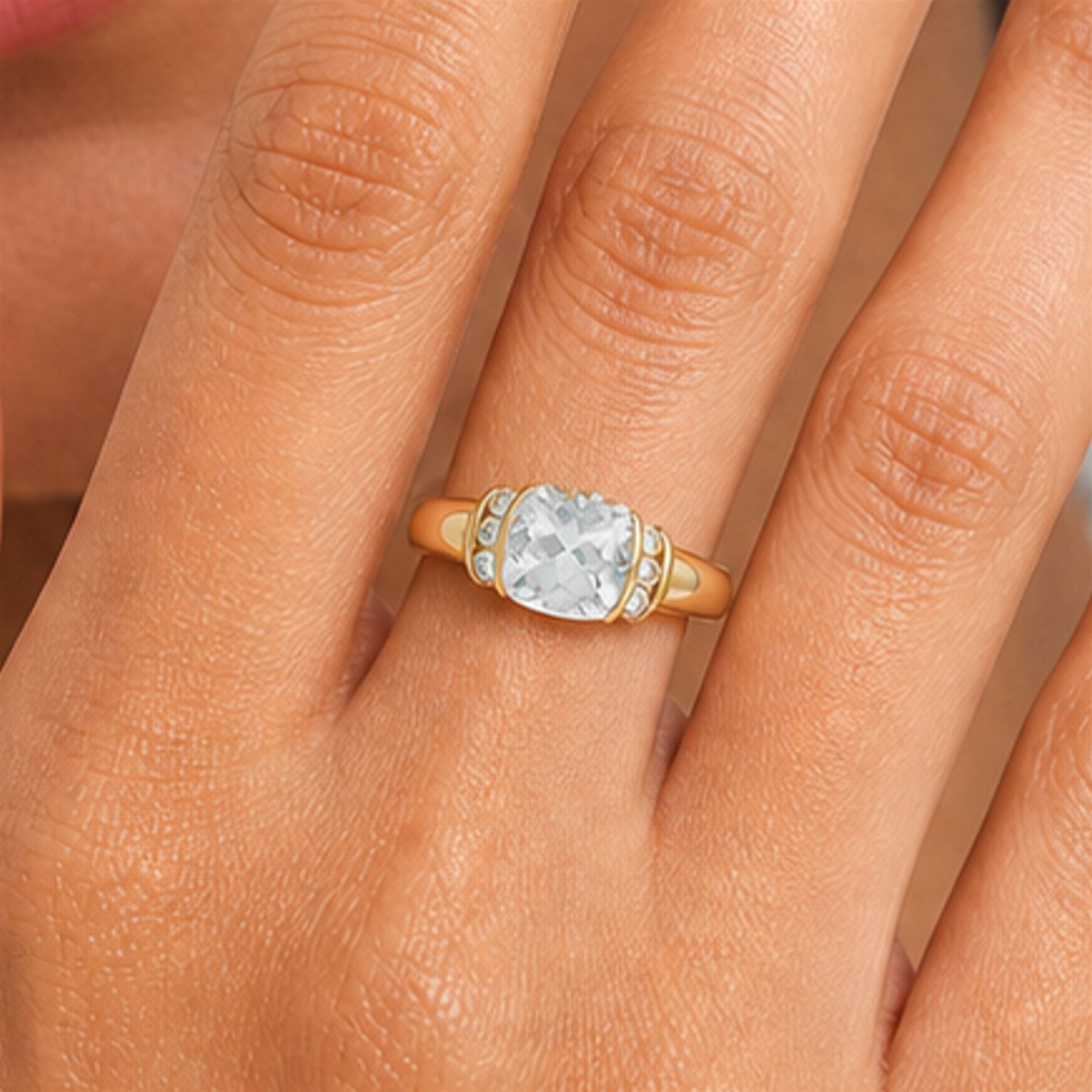 14ct gold aquamarine ring, single briolette cut aquamarine, with three round cut aquamarines set either side, stamped